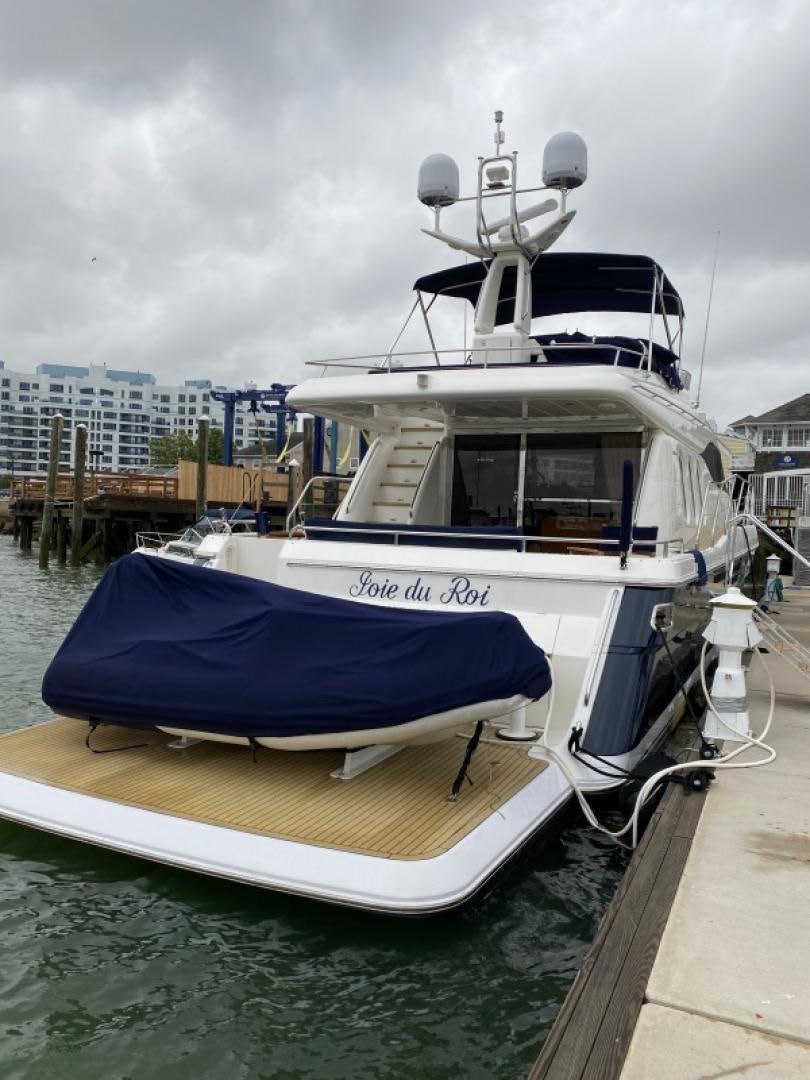 a boat docked at a pier aboard JOIE DU ROI Yacht for Sale