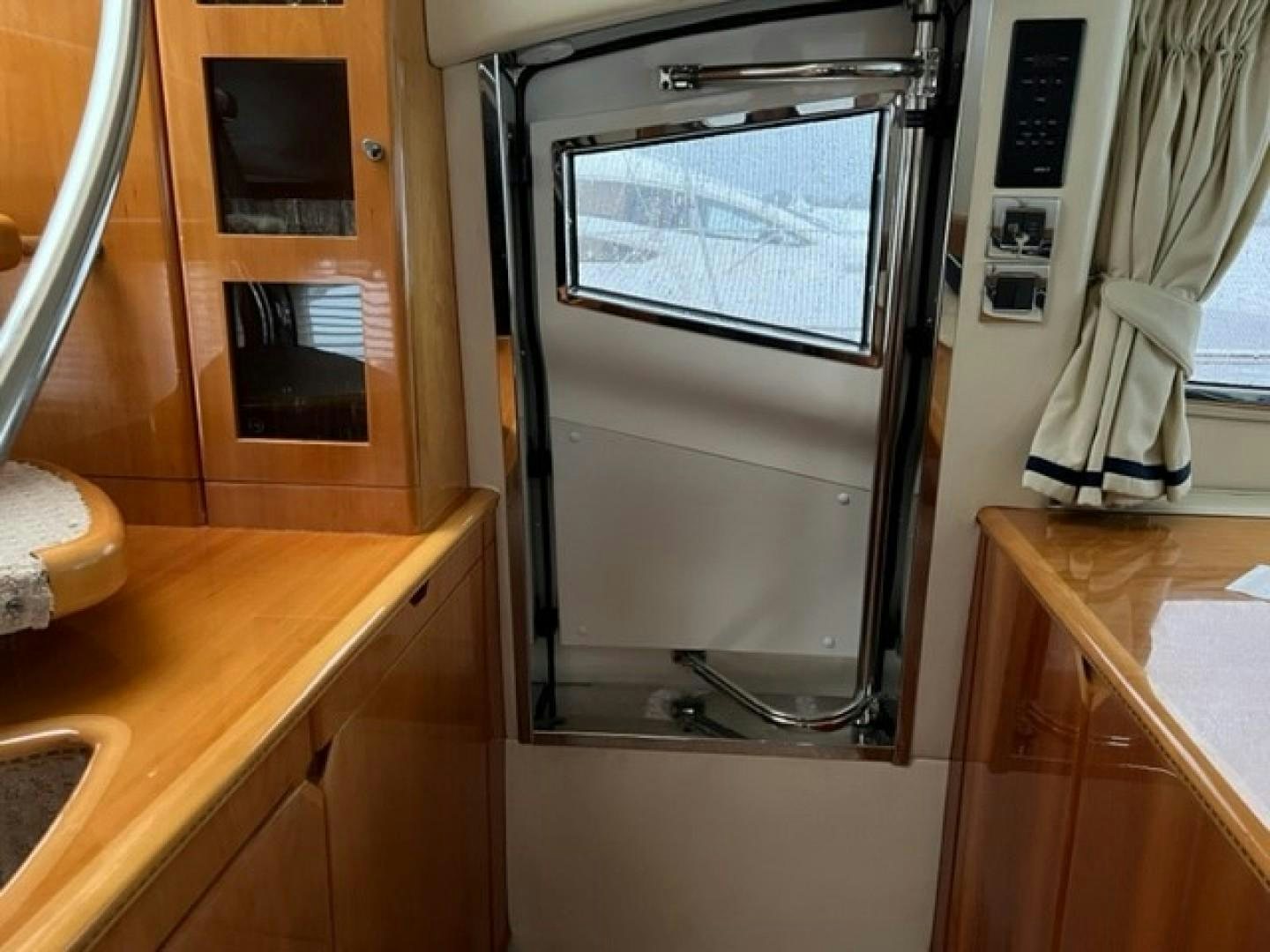 a microwave oven in a kitchen aboard JOIE DU ROI Yacht for Sale