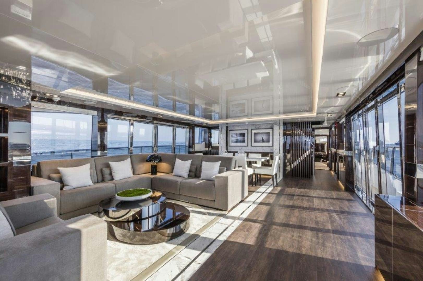 a living room with a large window aboard NONE Yacht for Sale