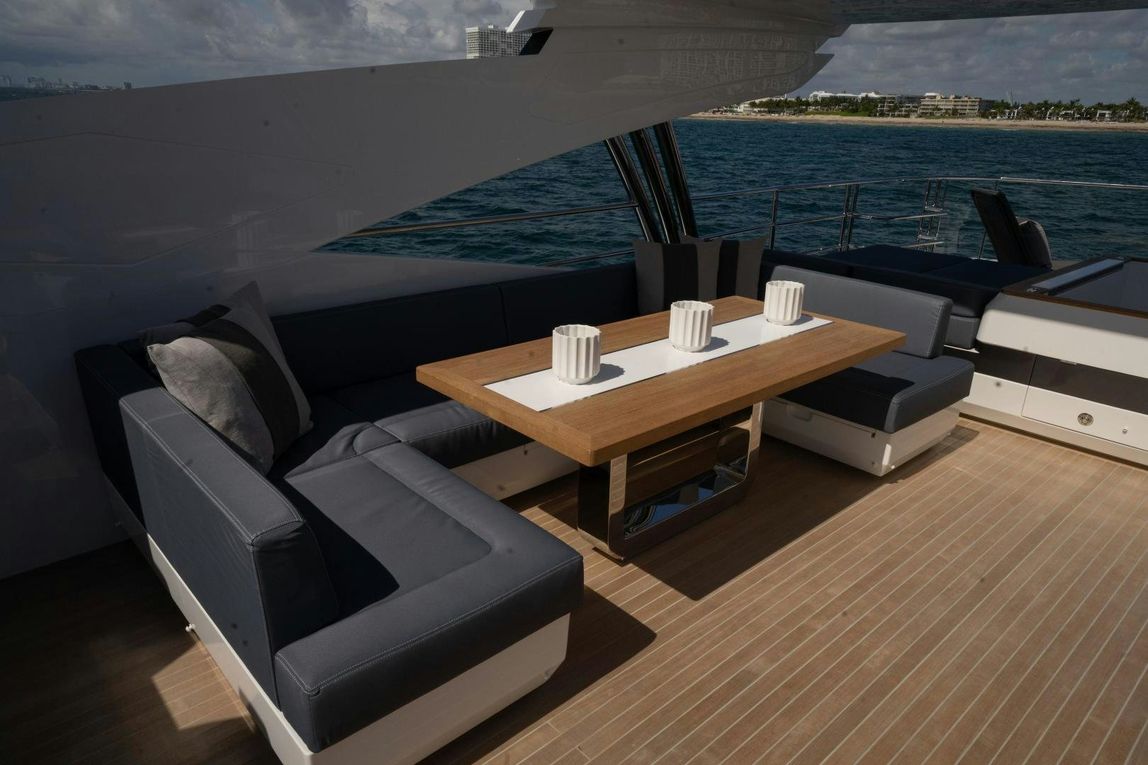 a room with a table and chairs aboard NONE Yacht for Sale