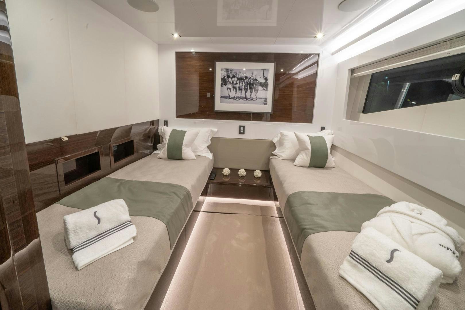 a room with a bed and a couch aboard NONE Yacht for Sale