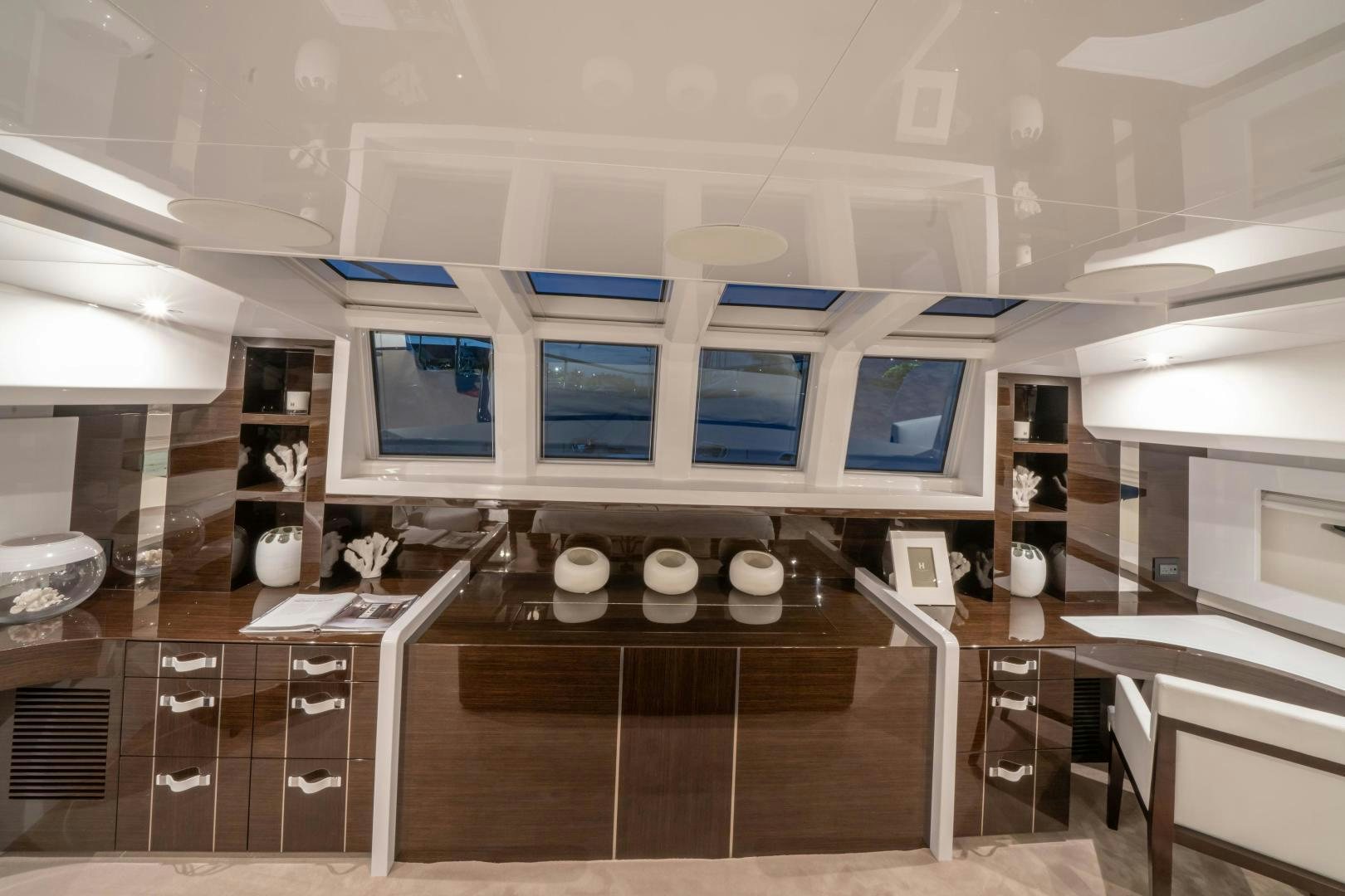 a room with a desk and computer aboard NONE Yacht for Sale