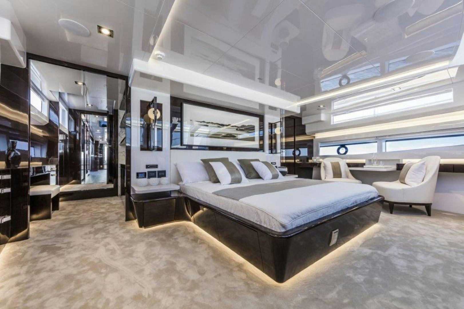 a room with a bed and a couch aboard NONE Yacht for Sale