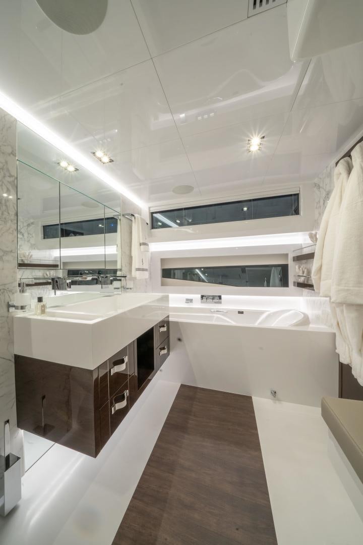 a bathroom with a large mirror aboard NONE Yacht for Sale
