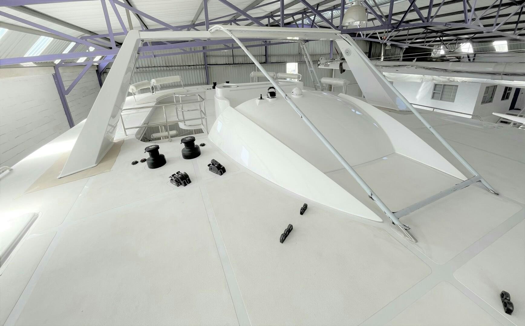 a large white room with a large white ceiling and a large white ceiling aboard SKYE Yacht for Sale