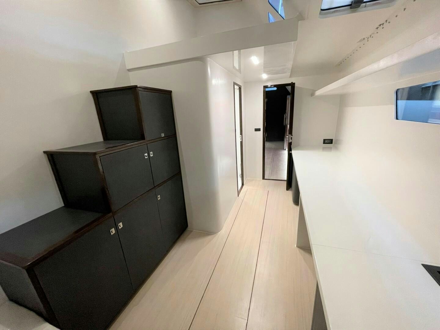 a room with a wood floor and a wood floor with a wood floor aboard SKYE Yacht for Sale