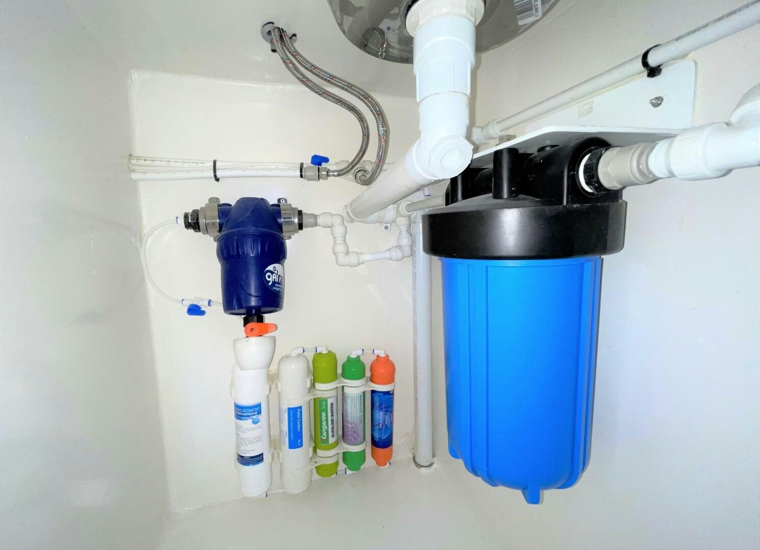 a blue container with a blue liquid aboard SKYE Yacht for Sale