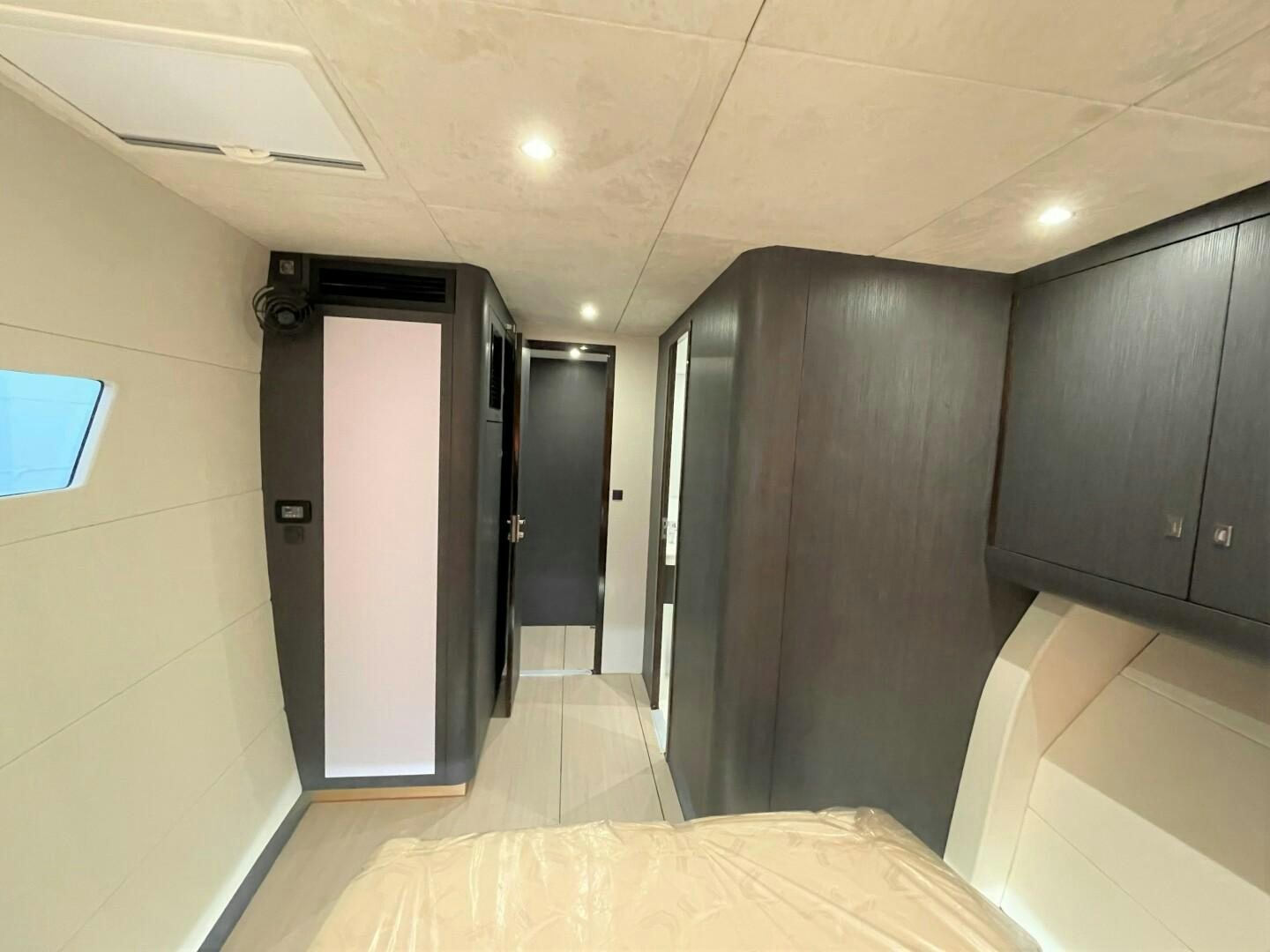 a room with a large closet aboard SKYE Yacht for Sale