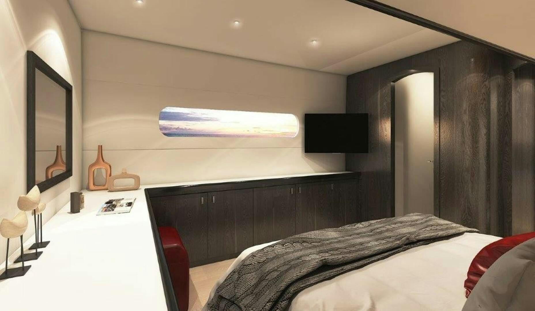 a bedroom with a bed and a tv aboard SKYE Yacht for Sale