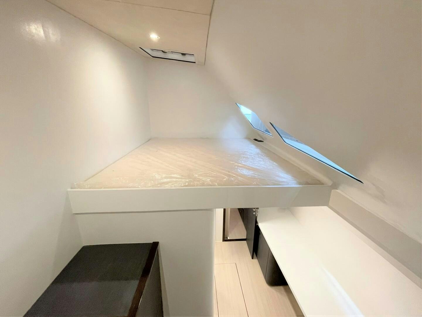 a table with a blue object on it aboard SKYE Yacht for Sale