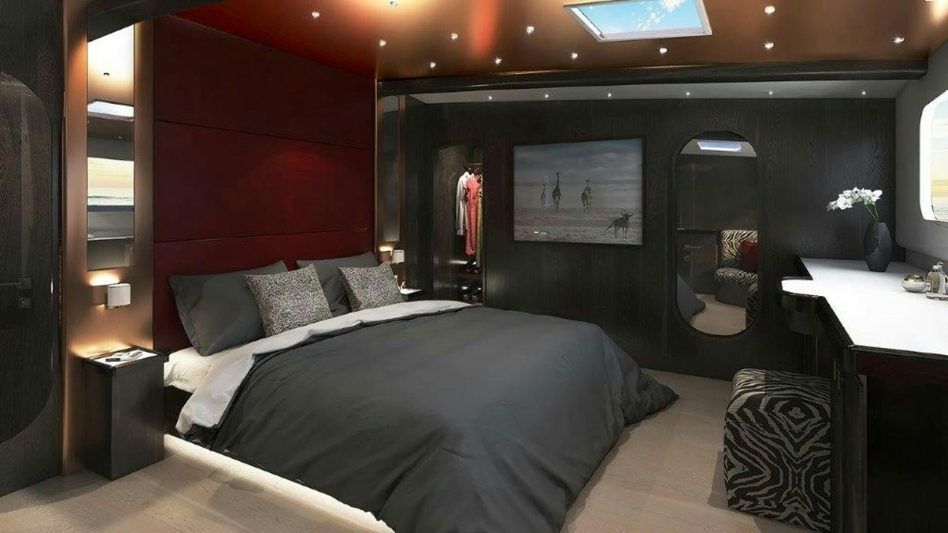 a bed in a room aboard SKYE Yacht for Sale