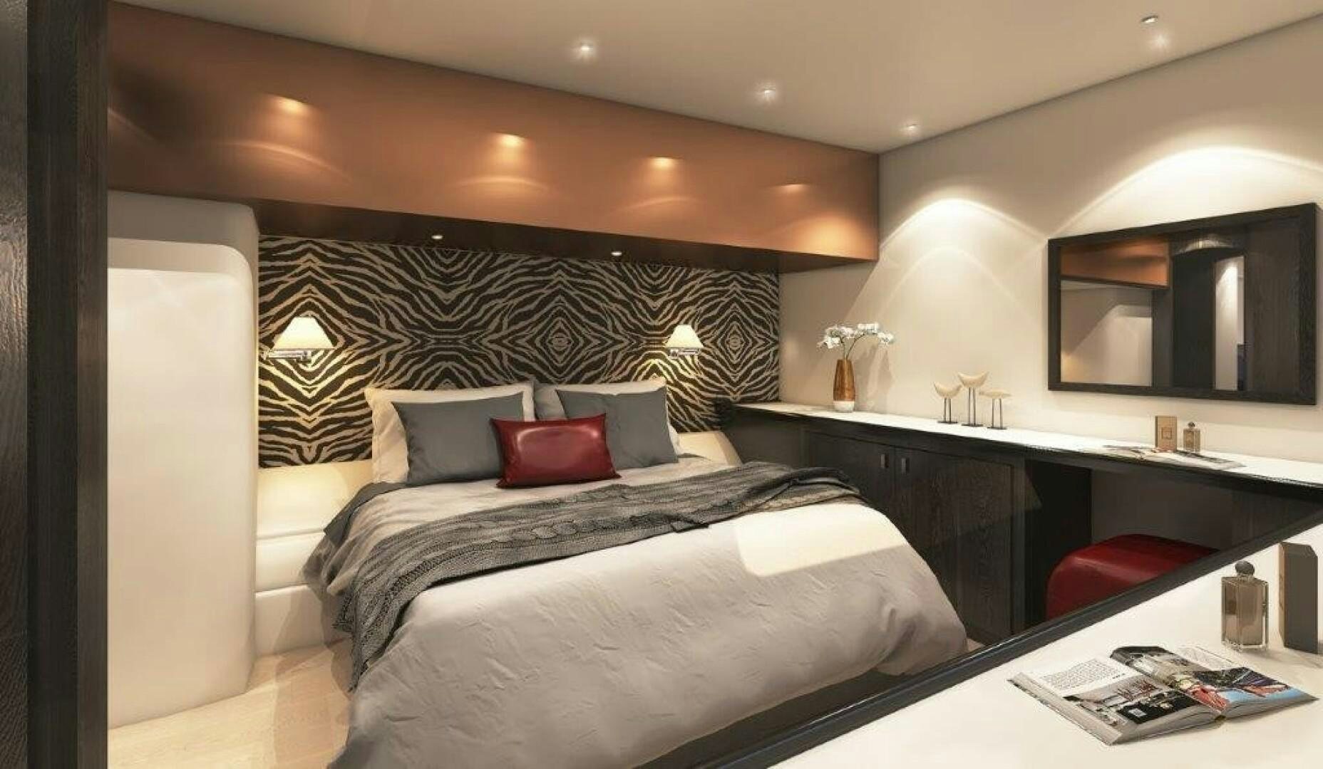 a room with a bed and a desk aboard SKYE Yacht for Sale