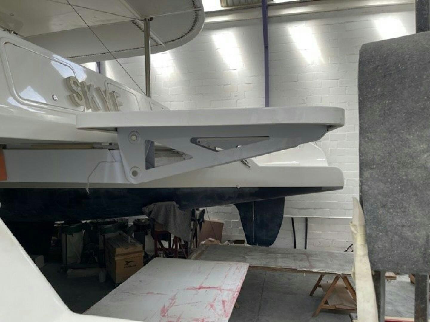 a white airplane in a room aboard SKYE Yacht for Sale