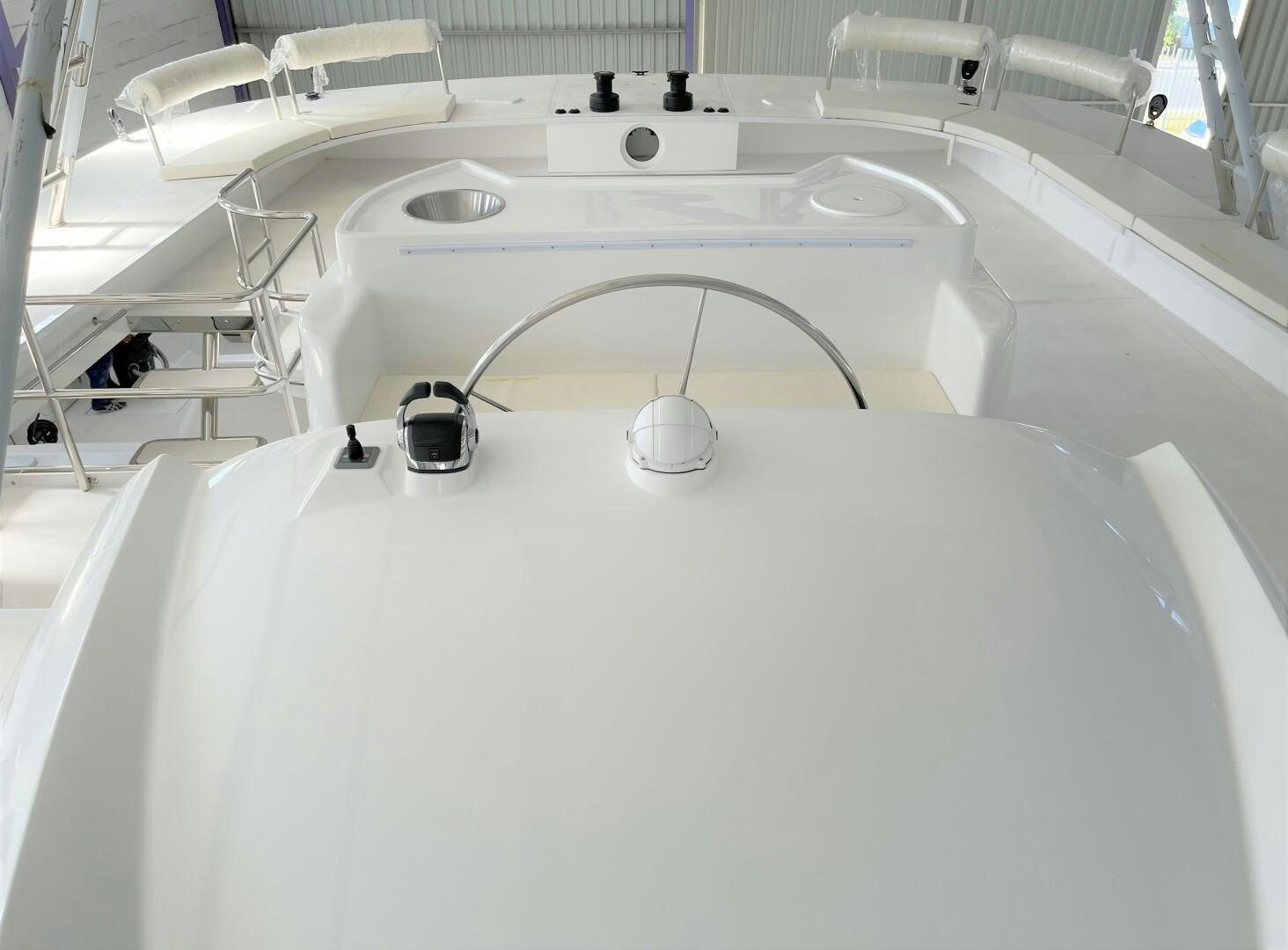a white room with a round white object on a white surface aboard SKYE Yacht for Sale