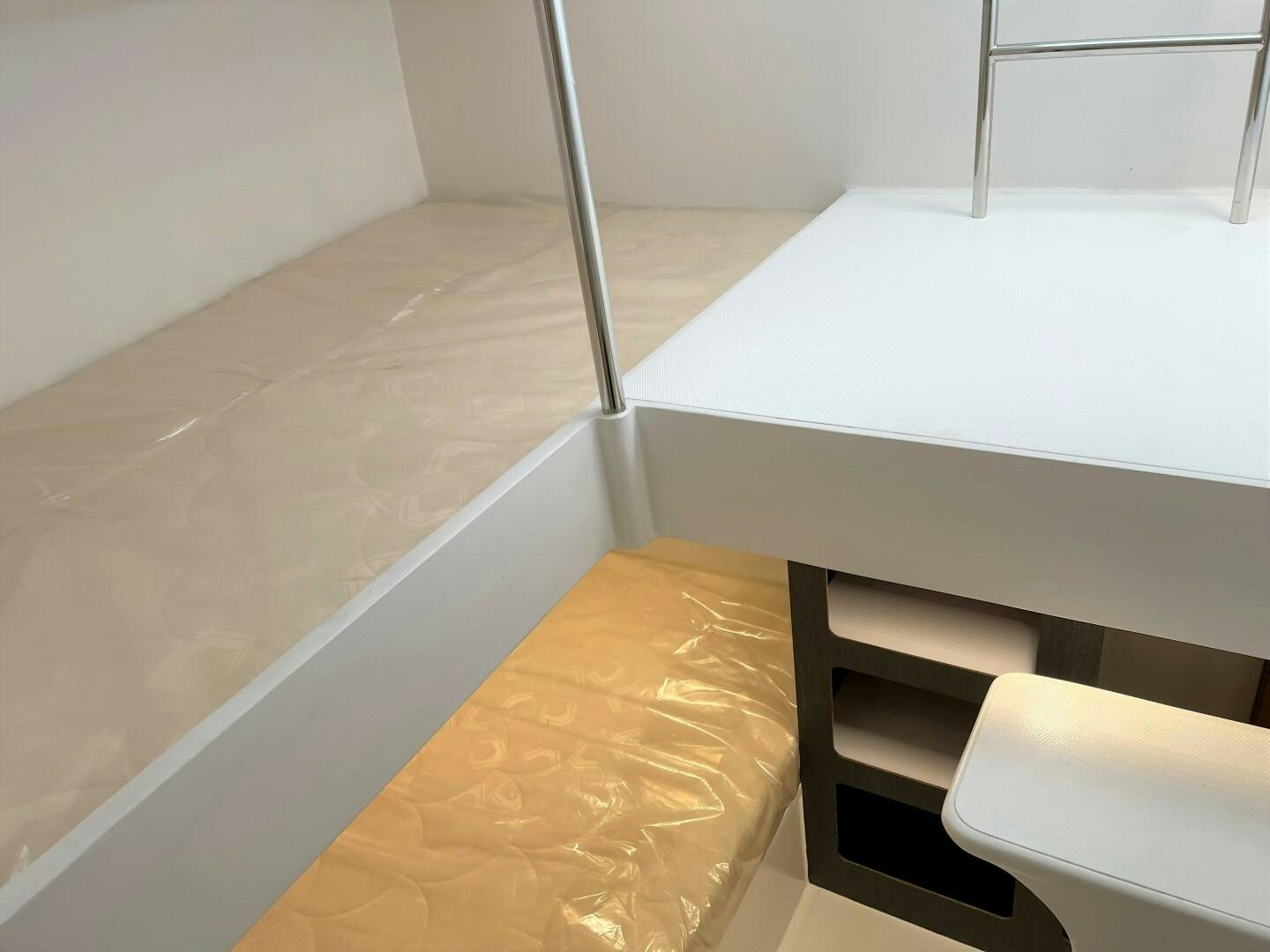 a white table and chairs aboard SKYE Yacht for Sale