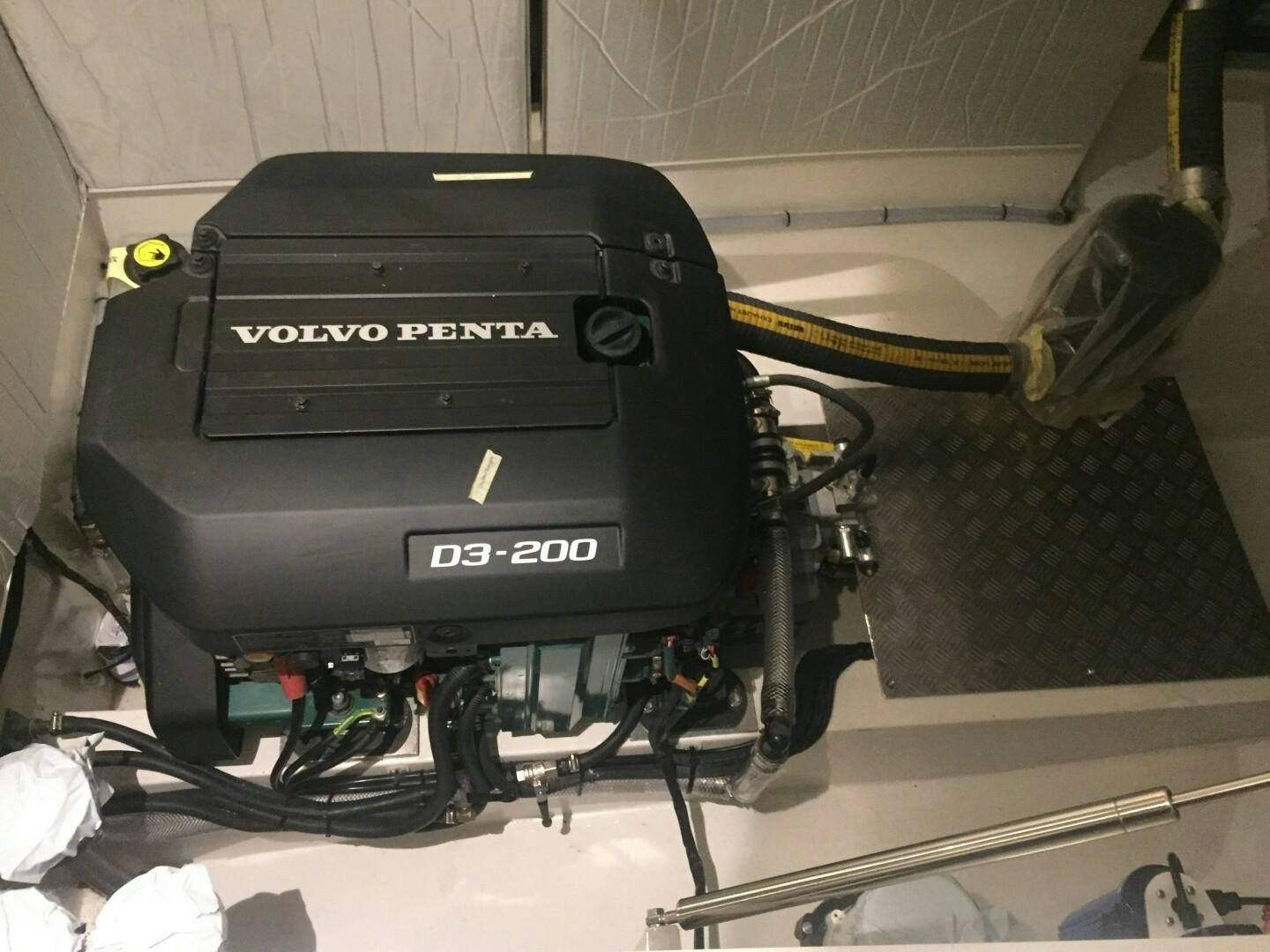 a black machine with a yellow handle aboard SKYE Yacht for Sale