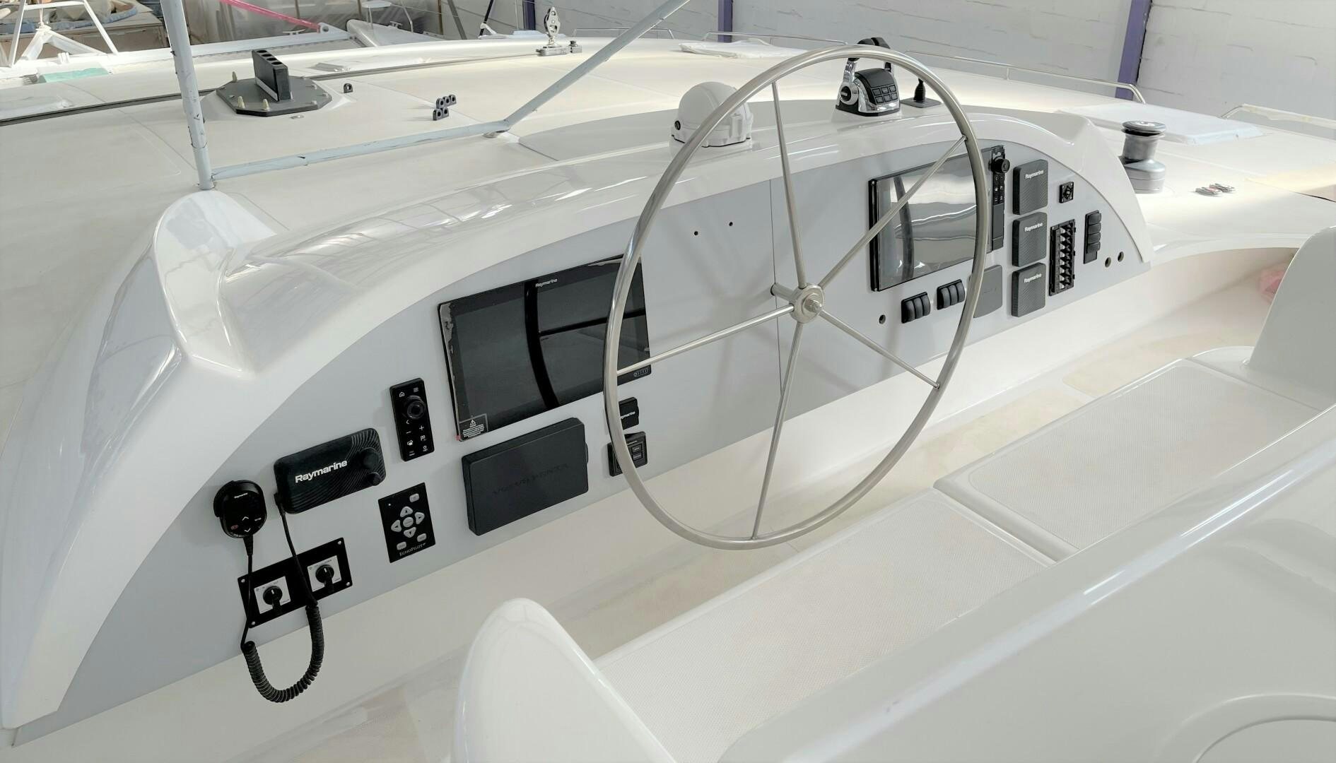 a white boat with black and white text on it aboard SKYE Yacht for Sale
