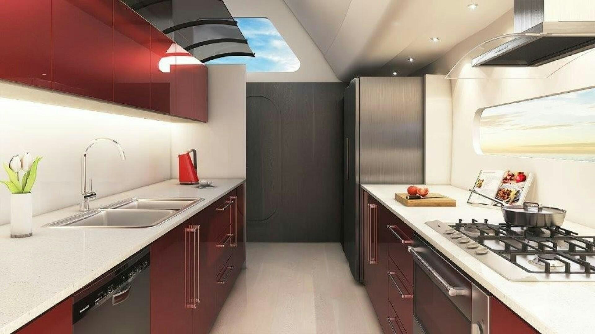 a kitchen with a stove and sink aboard SKYE Yacht for Sale