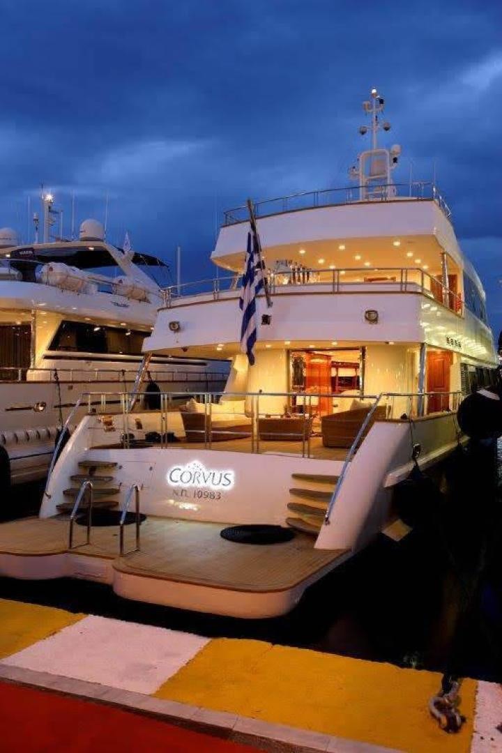 a boat docked at a pier aboard CORVUS Yacht for Sale