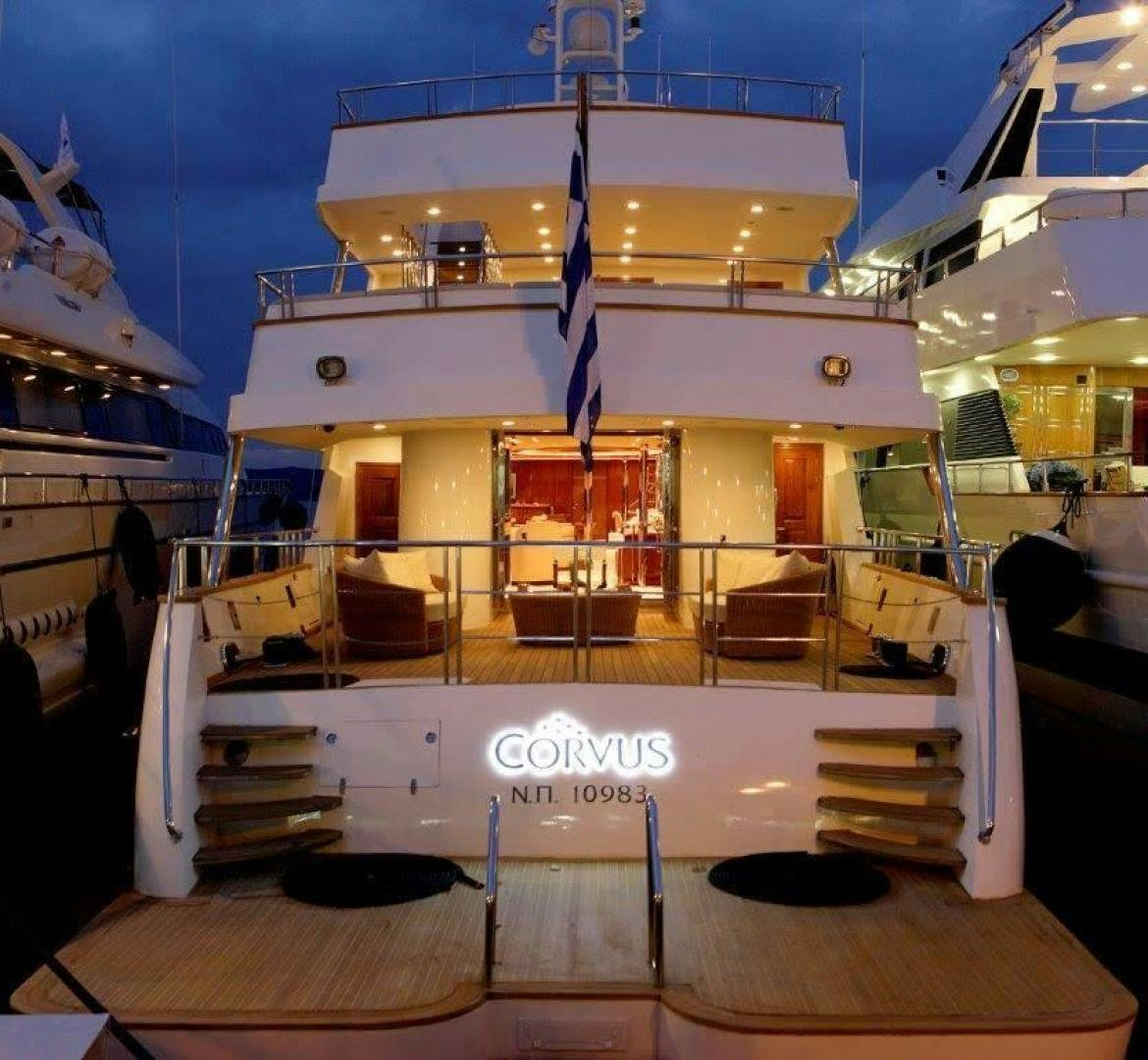 a large boat in a large body of water aboard CORVUS Yacht for Sale