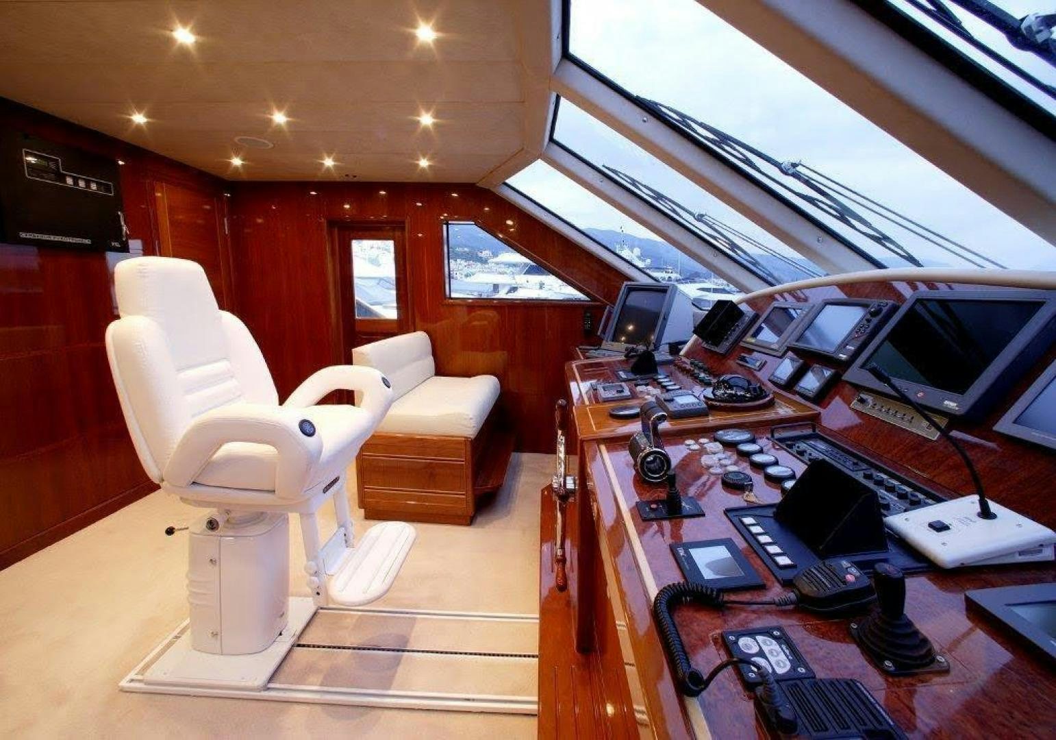 a room with a desk and a chair and a computer aboard CORVUS Yacht for Sale