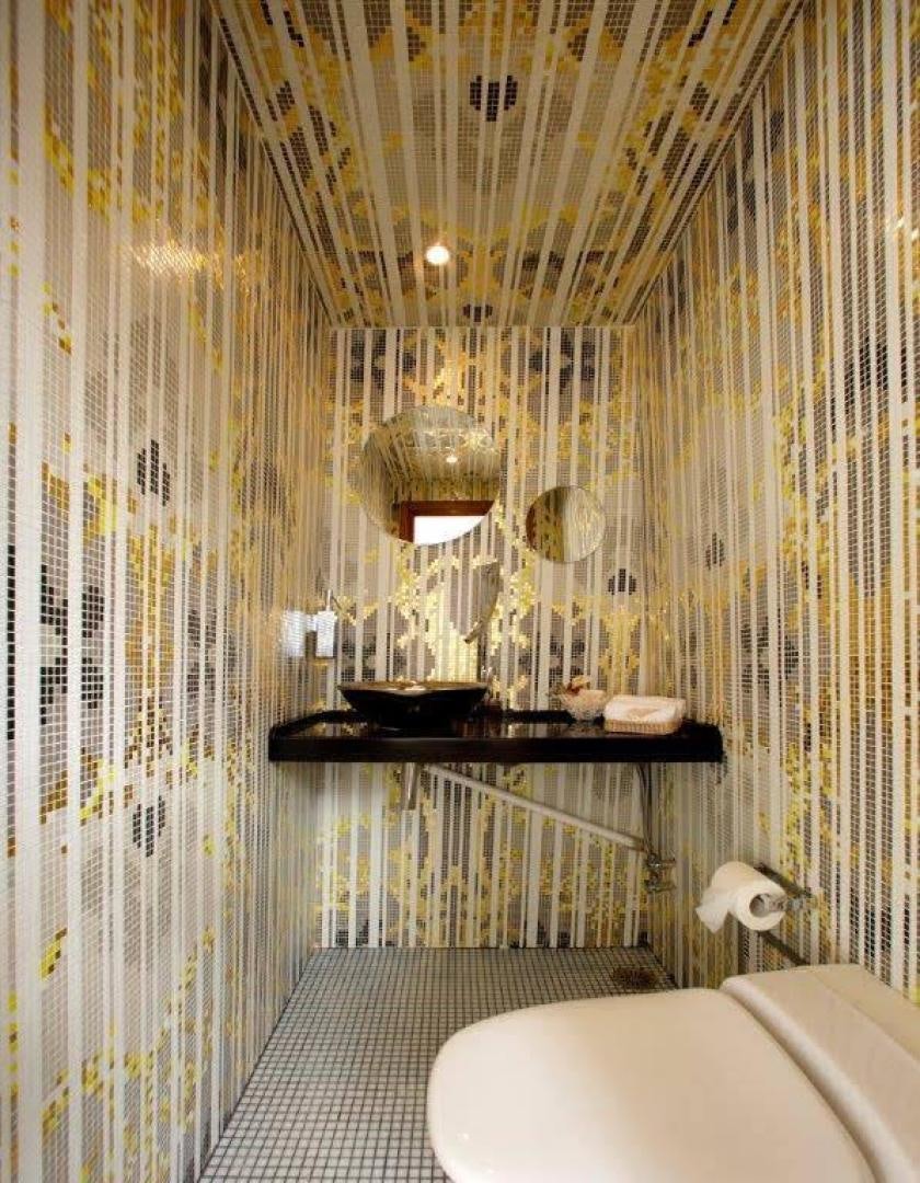 a bathroom with a sink and toilet aboard CORVUS Yacht for Sale