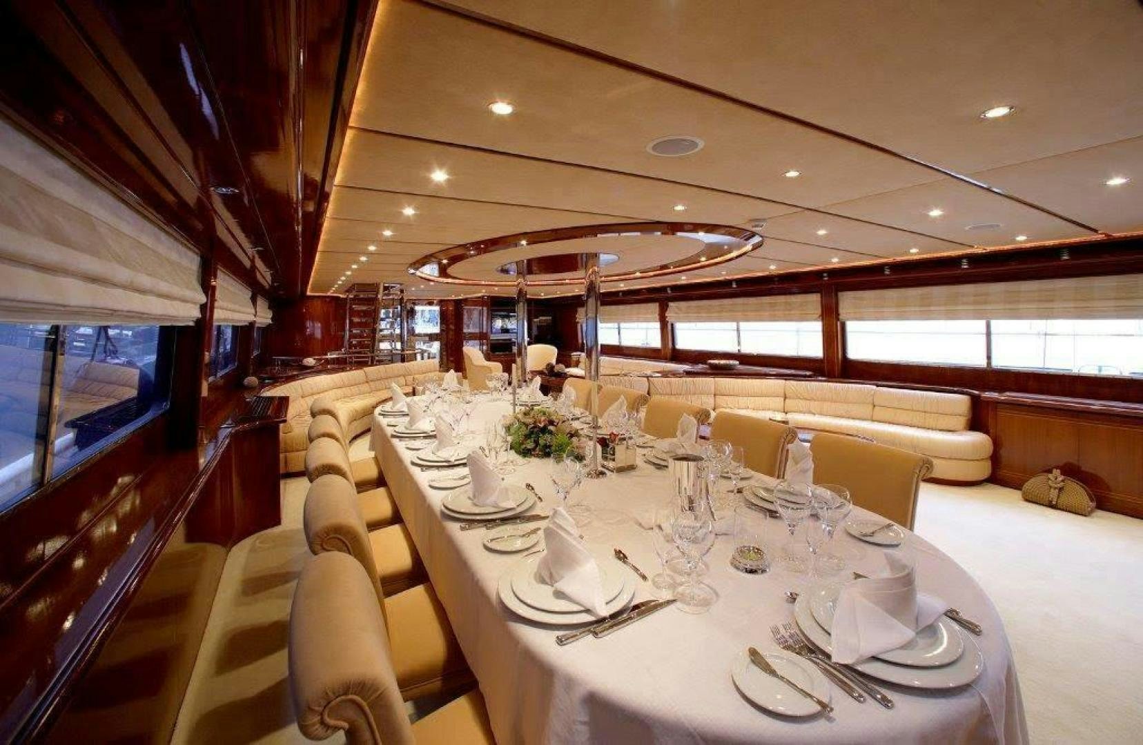 a table set for a dinner aboard CORVUS Yacht for Sale