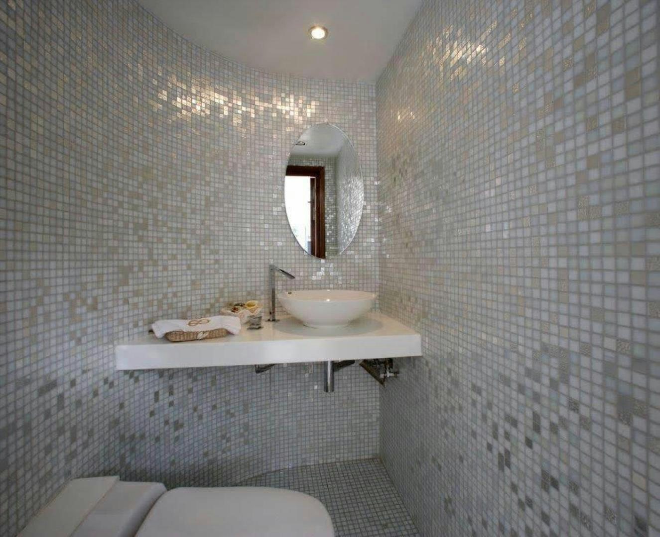 a bathroom with a sink and a toilet aboard CORVUS Yacht for Sale