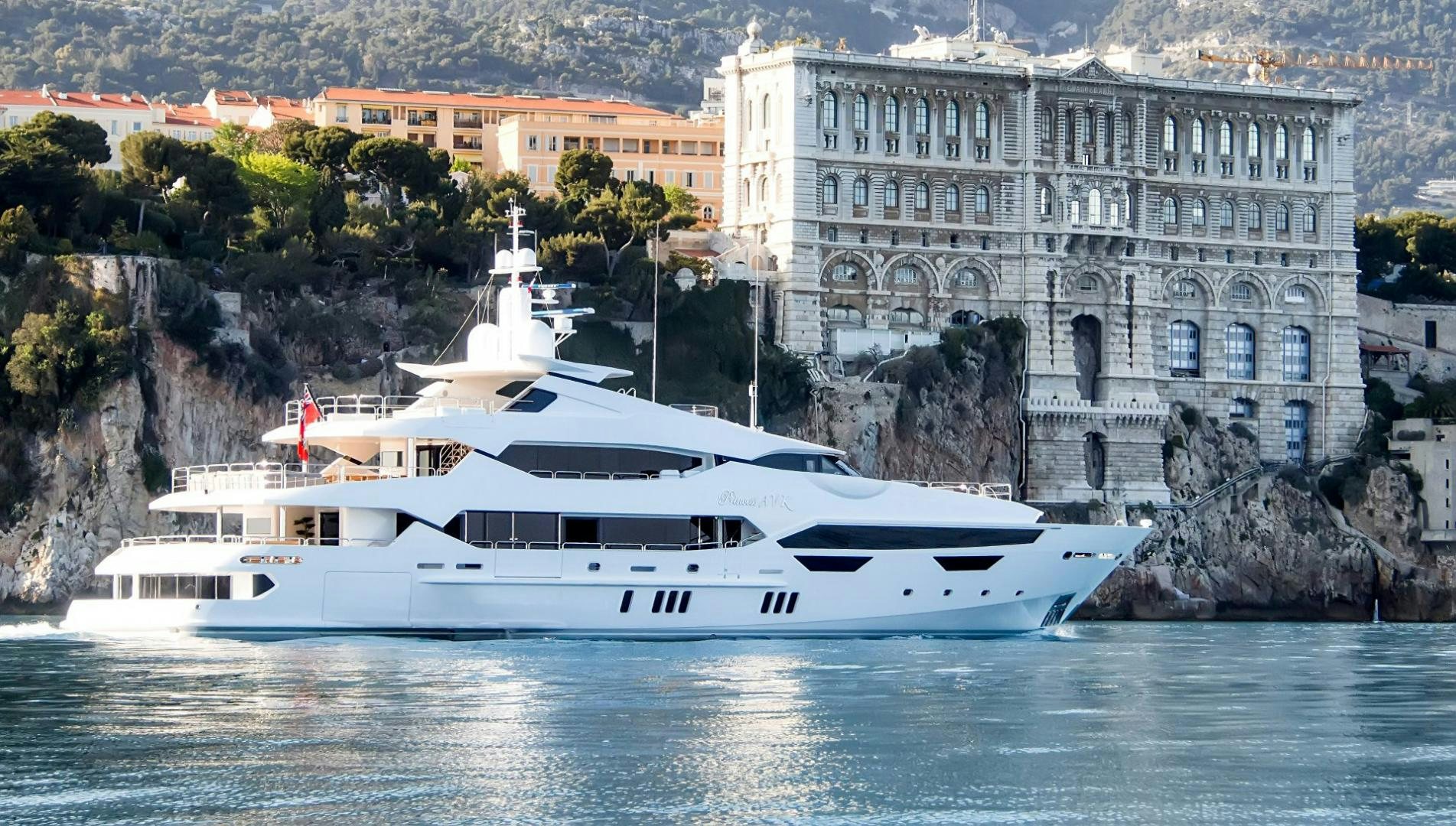 a white yacht in the water aboard Q Yacht for Sale