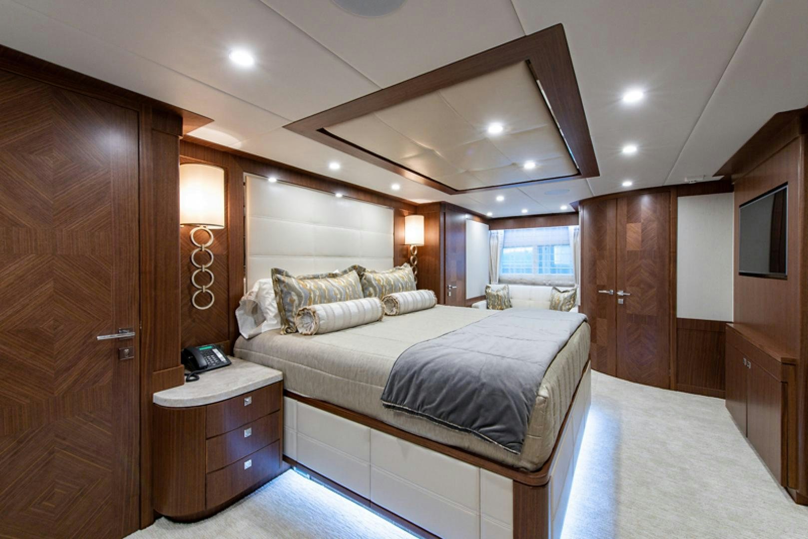 a large bedroom with a bed aboard GALATI G120 SIGNATURE SERIES Yacht for Sale