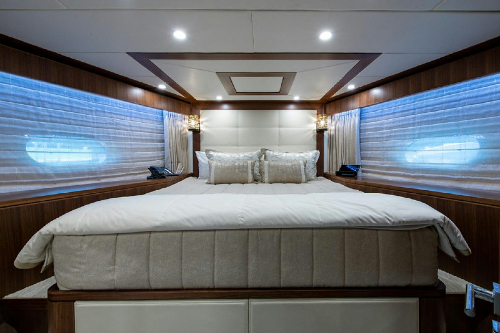 a bed with a white sheet aboard GALATI G120 SIGNATURE SERIES Yacht for Sale