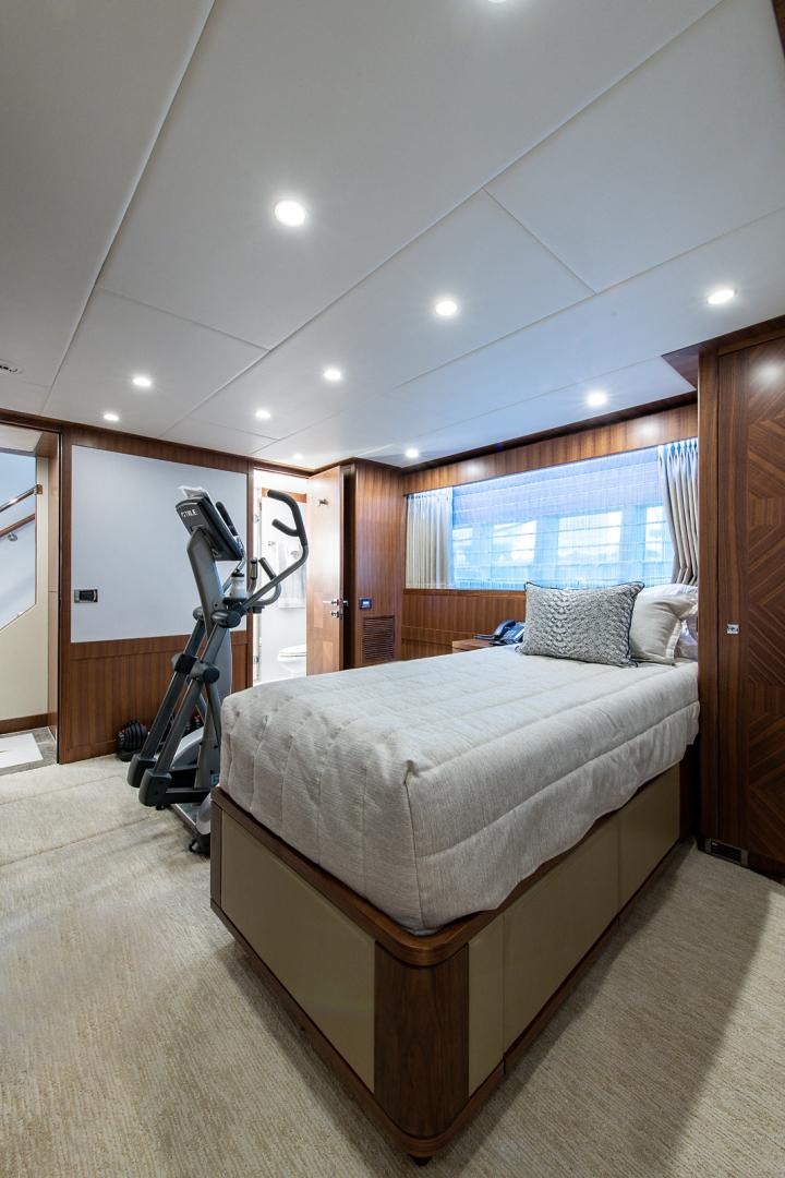 a bedroom with a bed and a ladder aboard GALATI G120 SIGNATURE SERIES Yacht for Sale