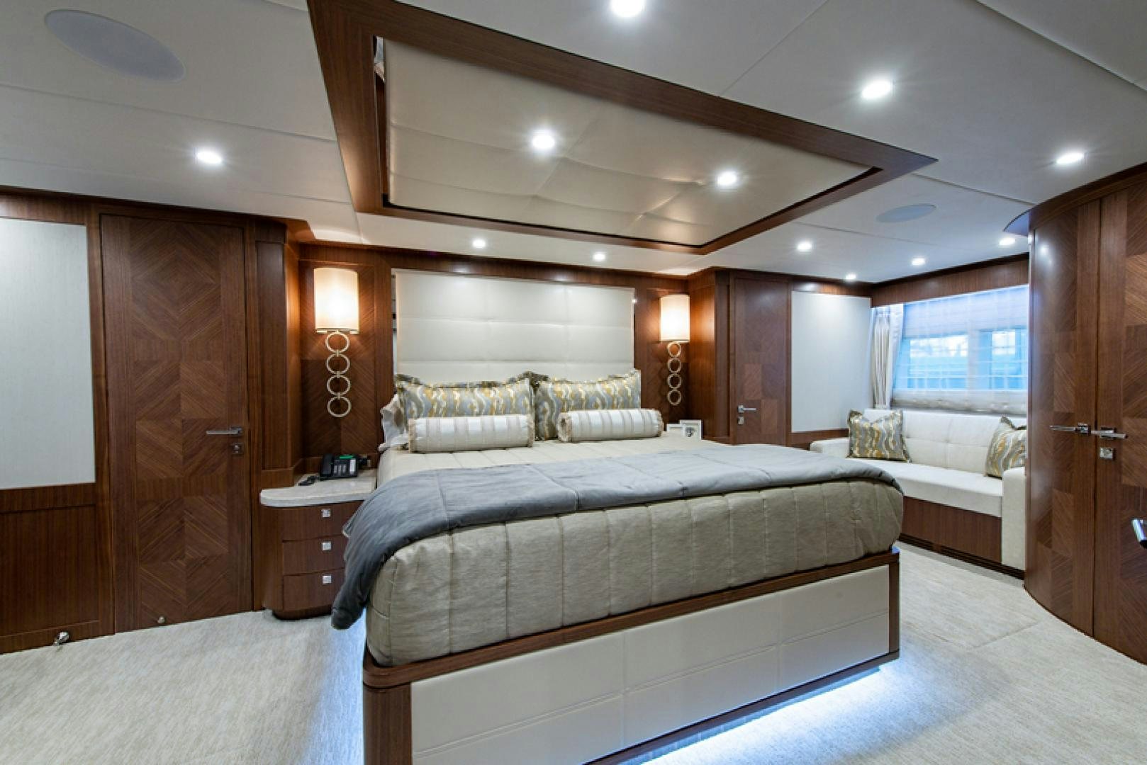 a large bedroom with a bed aboard GALATI G120 SIGNATURE SERIES Yacht for Sale