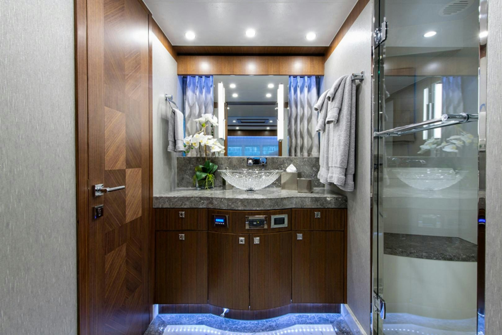a bathroom with a sink and a mirror aboard GALATI G120 SIGNATURE SERIES Yacht for Sale