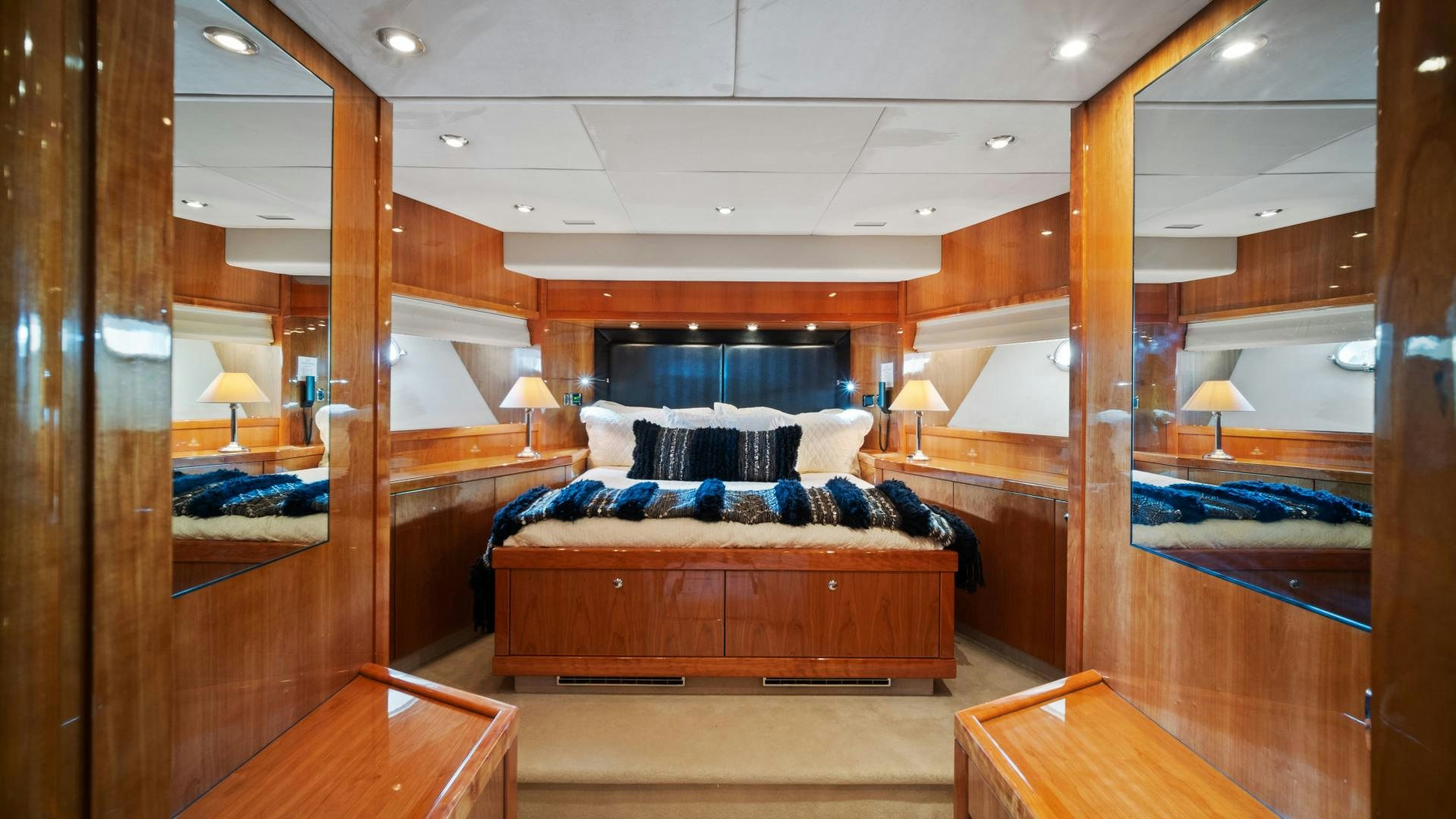 a bedroom with a large bed aboard DIABLO BLANCO Yacht for Sale