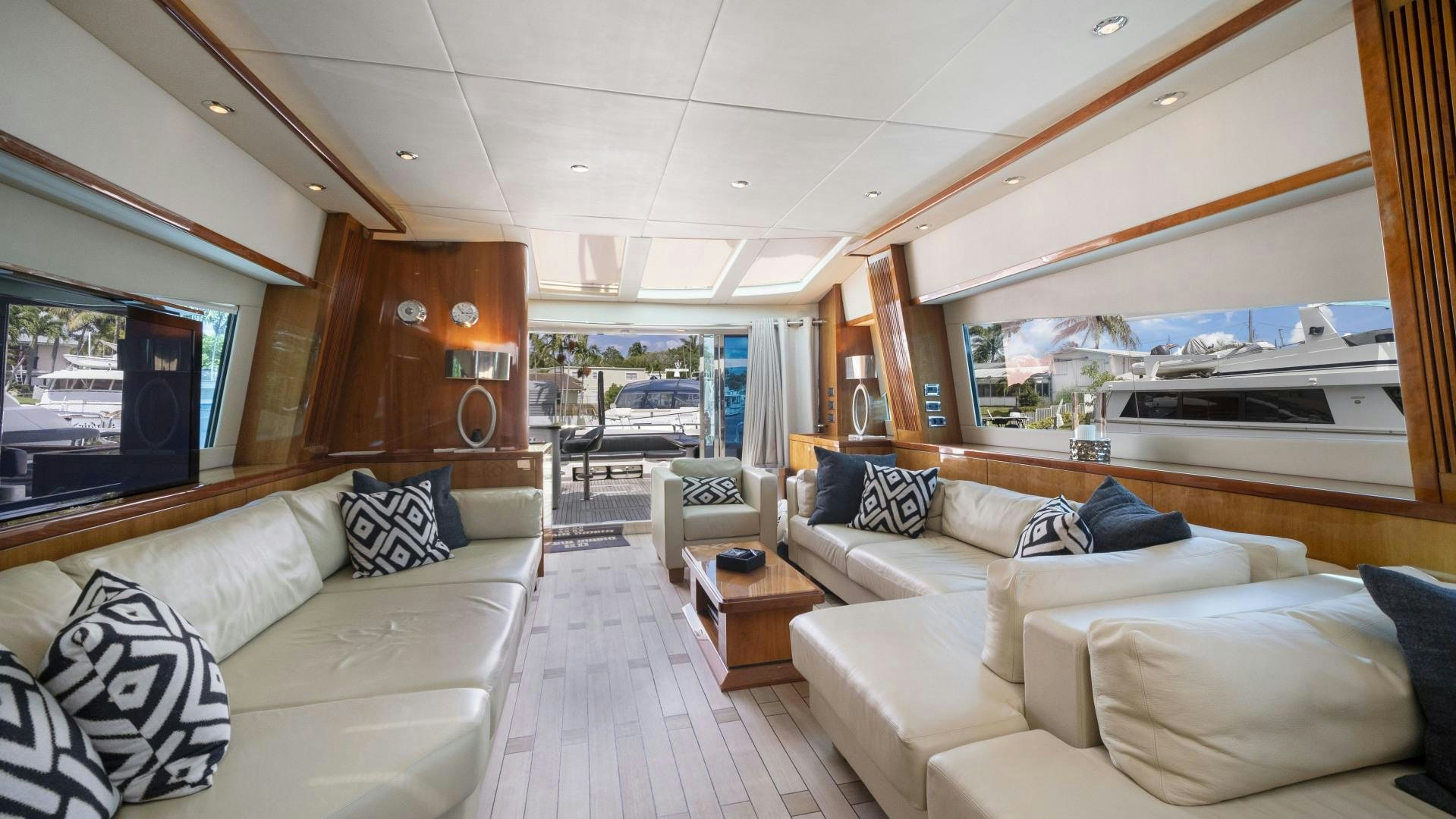 a living room with a large window aboard DIABLO BLANCO Yacht for Sale