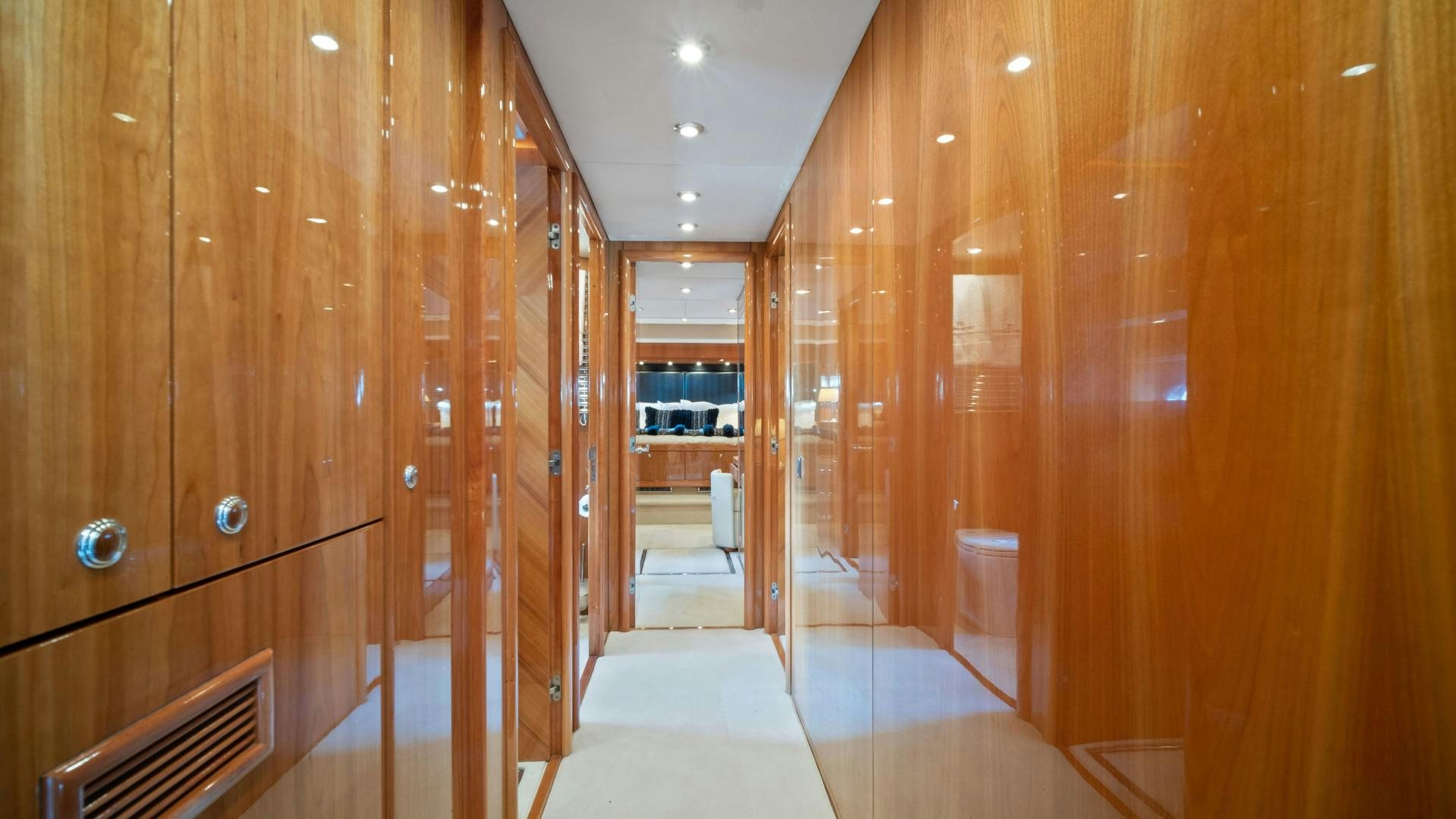 a room with wooden cabinets aboard DIABLO BLANCO Yacht for Sale