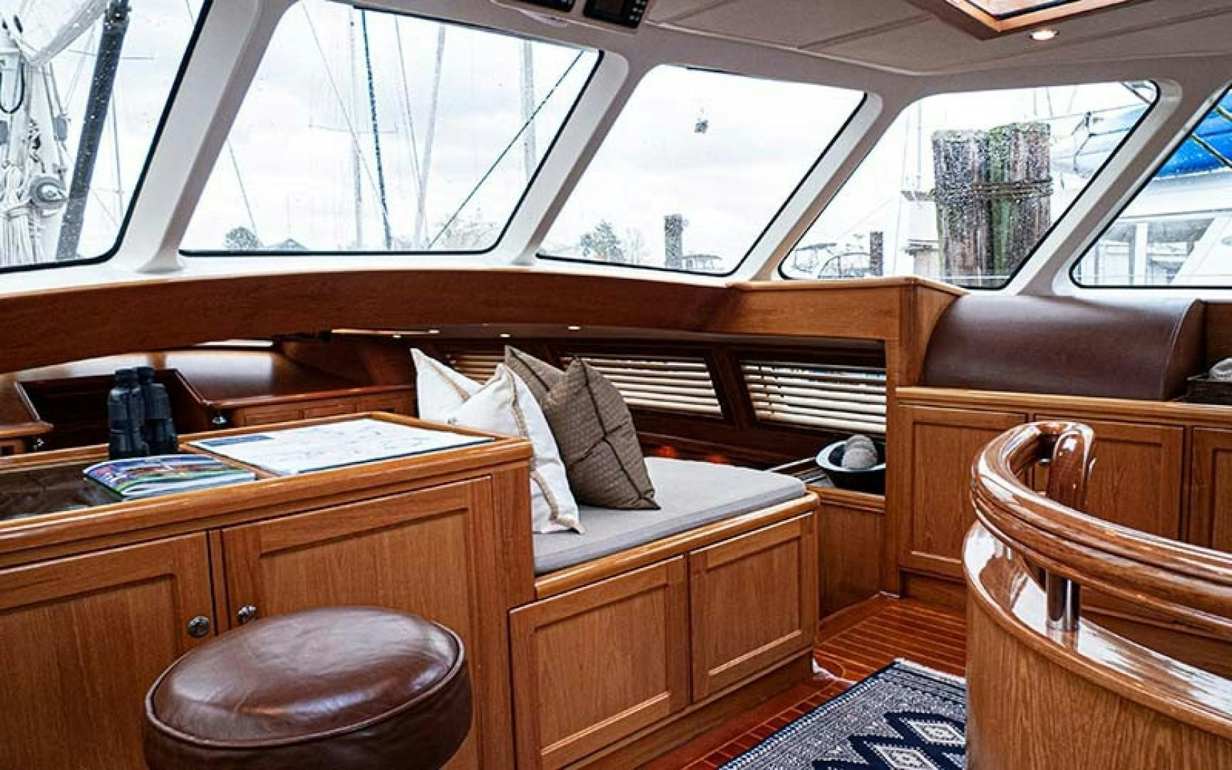 a room with a bed and a desk aboard AVALON Yacht for Sale