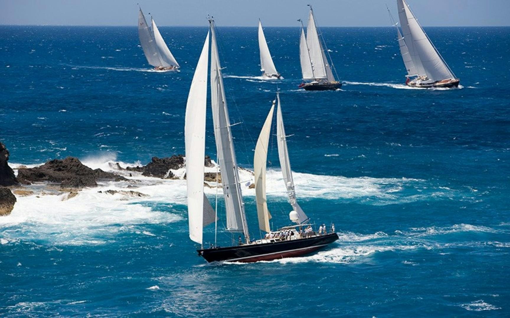 sailboats in the ocean aboard AVALON Yacht for Sale