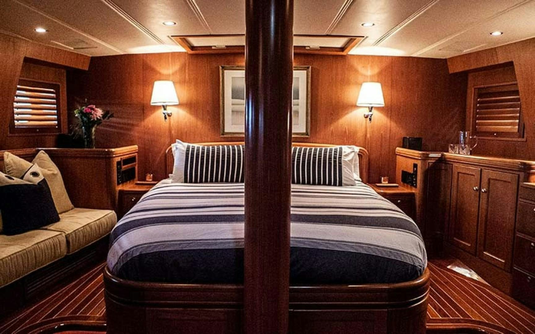 a bed in a room aboard AVALON Yacht for Sale