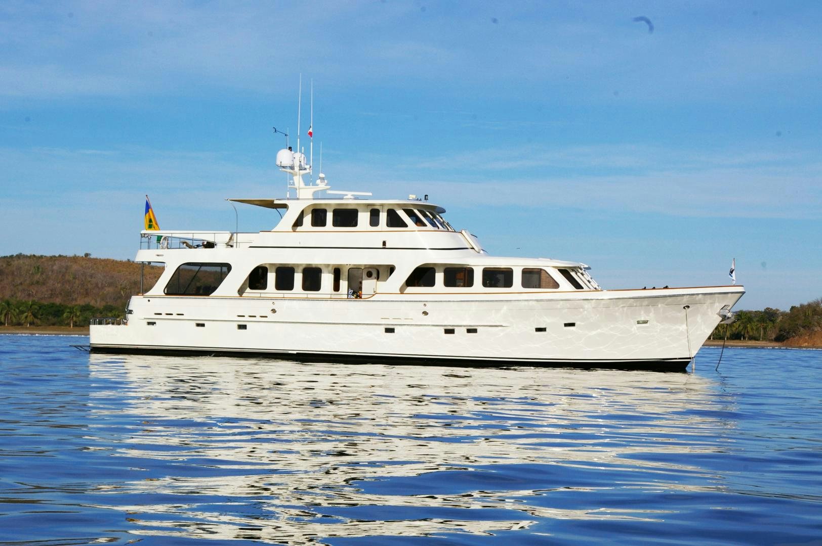 a white boat on water aboard ANTARES Yacht for Sale
