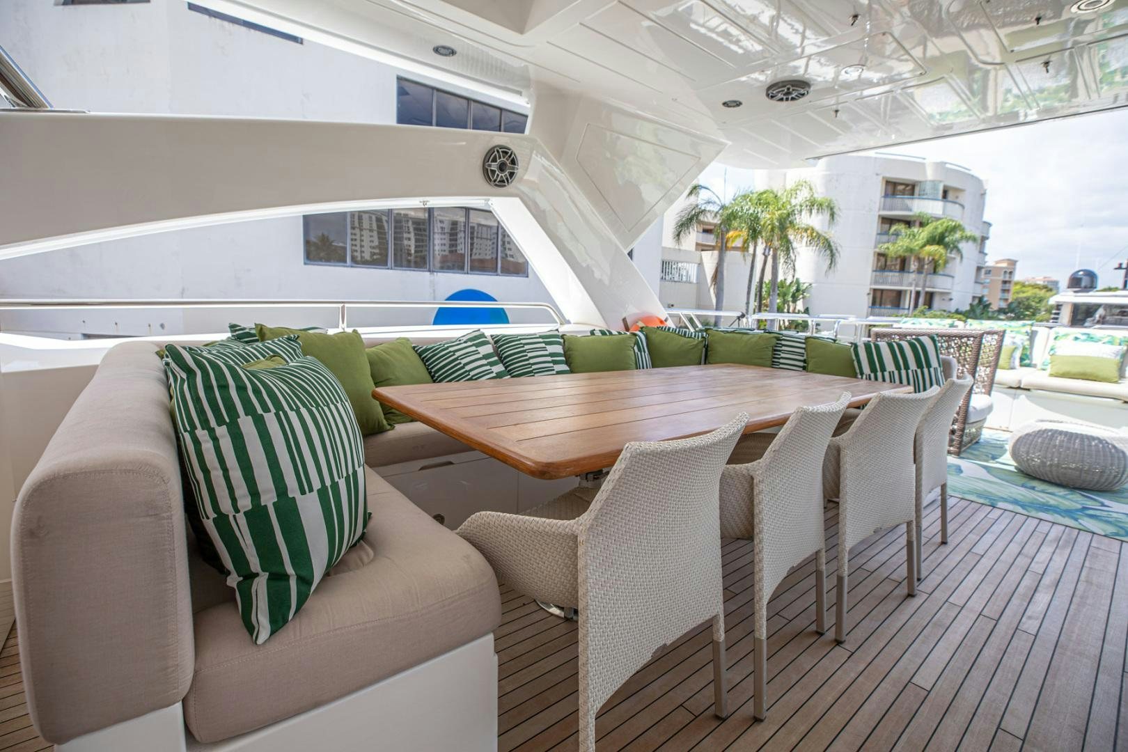 a room with a table and chairs aboard LE SORELLE III Yacht for Sale