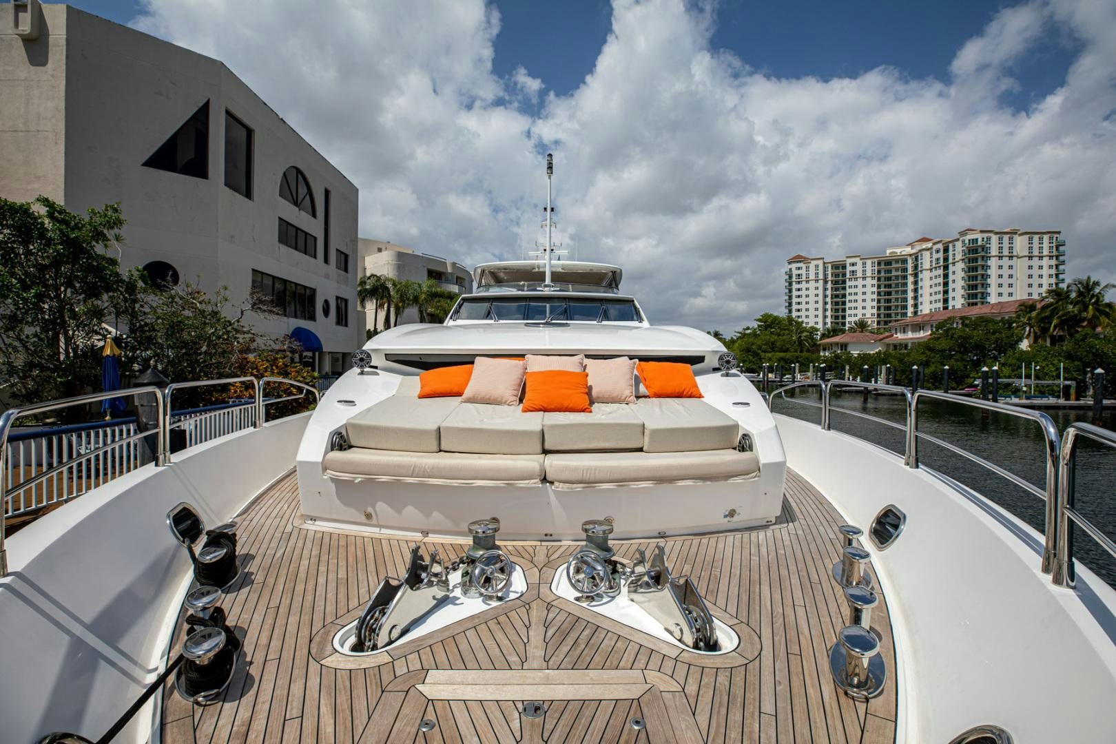 a white car on a road aboard LE SORELLE III Yacht for Sale