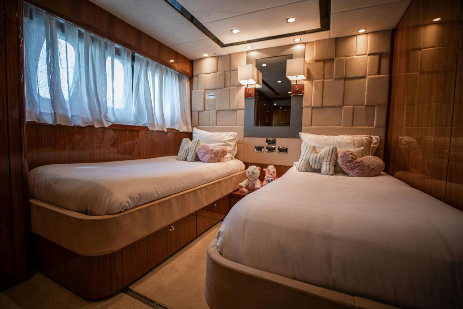 a room with two beds aboard LE SORELLE III Yacht for Sale