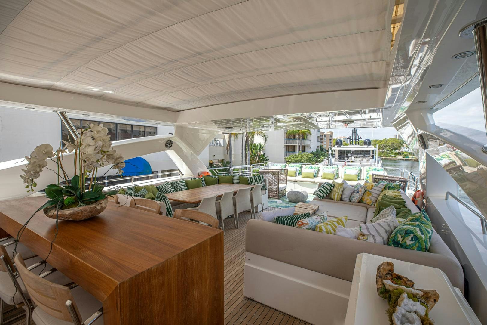 a room with a table and chairs aboard LE SORELLE III Yacht for Sale