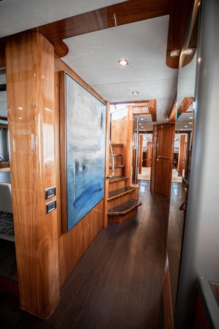 a room with wooden doors aboard LE SORELLE III Yacht for Sale