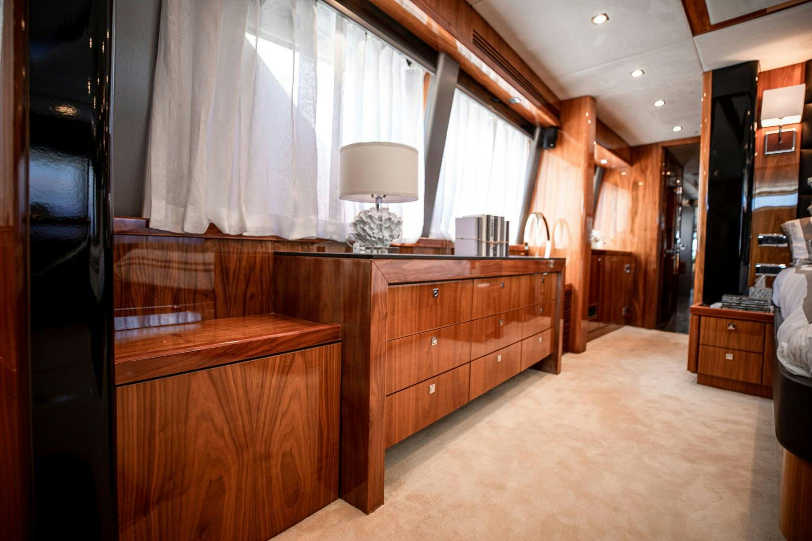 a room with a desk and a lamp aboard LE SORELLE III Yacht for Sale
