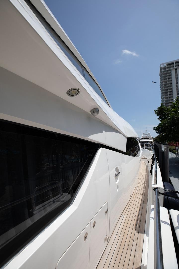 a white bus on the street aboard LE SORELLE III Yacht for Sale
