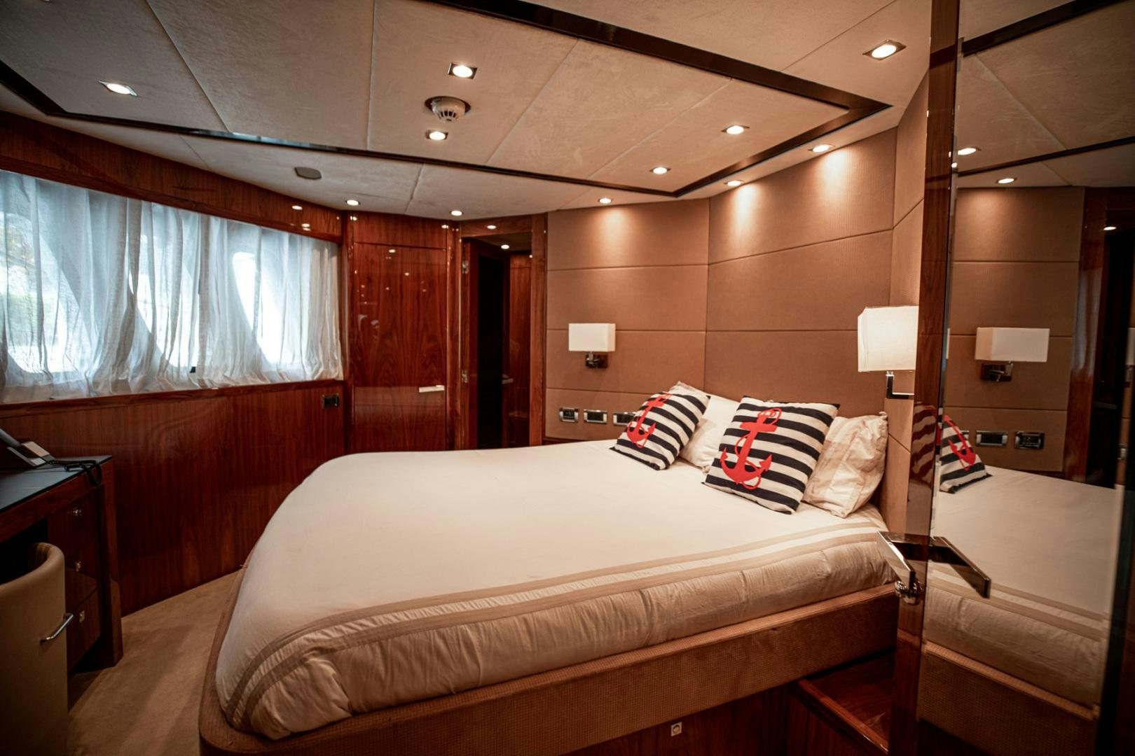 a hotel room with a bed aboard LE SORELLE III Yacht for Sale