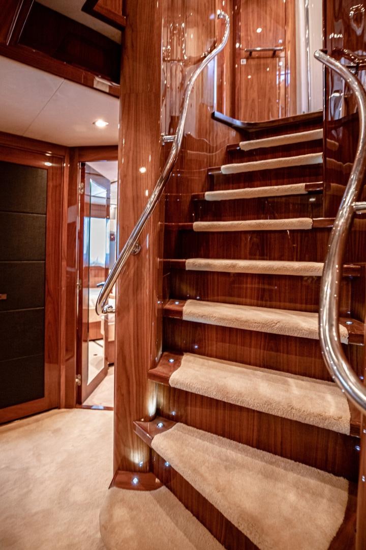 a set of wooden stairs aboard LE SORELLE III Yacht for Sale